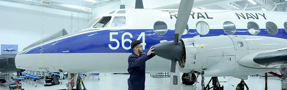 aerospace engineer fixing propeller